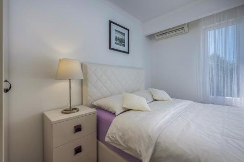 Un ou plusieurs lits dans un hébergement de l'établissement ADRIATIC DREAM - Luxury Apartment & Private Pool only for You