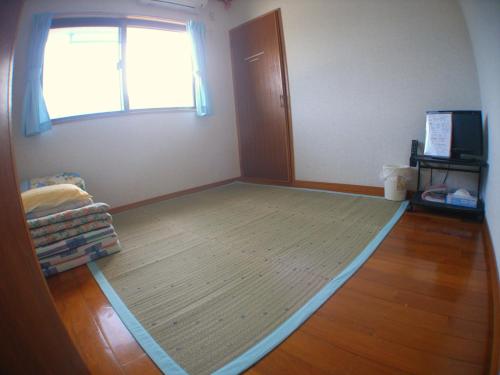 Photo de la galerie de l'établissement Minshuku Yadokari, à Zamami