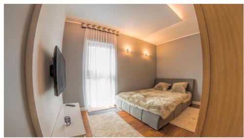 Llit o llits en una habitació de Apartament 75,143 Porta Mare