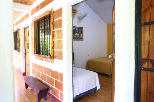 Postel nebo postele na pokoji v ubytování Viñas Hotel