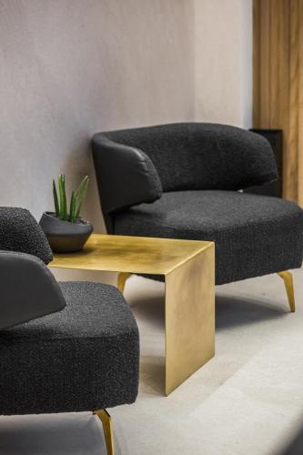 Un lugar para sentarse en Canale Hotel & Suites