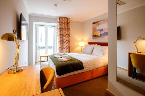 Кровать или кровати в номере Comtesse Lisbonne Guest House