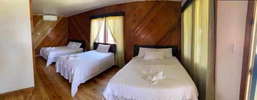 Un ou plusieurs lits dans un hébergement de l'établissement Coral View Beach Resort
