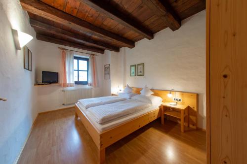 Katil atau katil-katil dalam bilik di B&B Unterhabsbergerhof