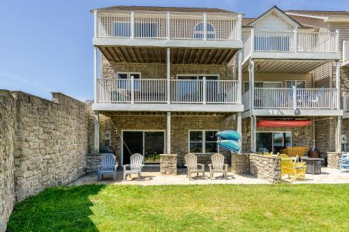 a house with a patio with chairs and tables at Oak Alley in Mineral
