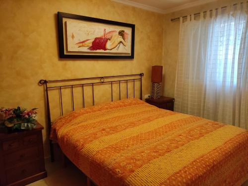 A bed or beds in a room at Apartamento Bolnuevo (Mazarrón)