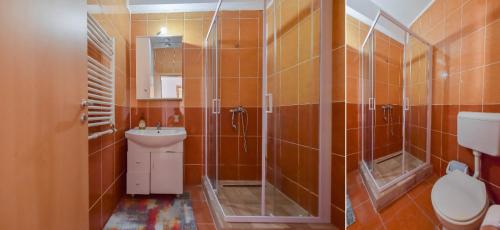 Et badeværelse på MAMAIA SAMMERLAND APARTAMENT 3 camere