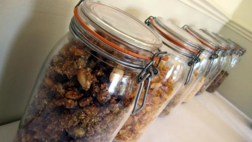 a group of jars filled with nuts on a shelf at Yeo Dale Hotel in Barnstaple