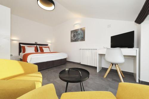 Voodi või voodid majutusasutuse Villa Adrian toas