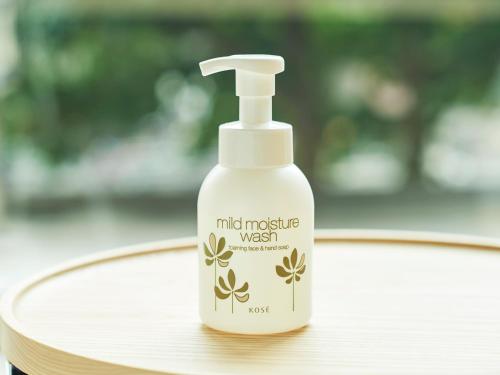a bottle of moisturizing wash sitting on a table at Sotetsu Fresa Inn Hiroshima in Hiroshima