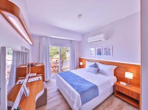 Кровать или кровати в номере Olea Nova Hotel