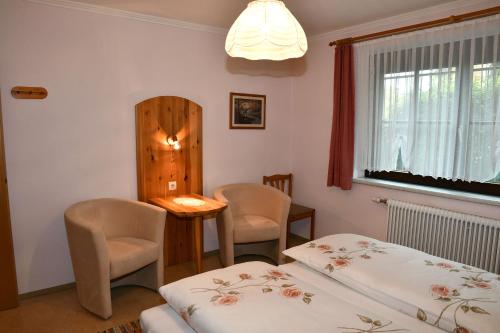 Posteľ alebo postele v izbe v ubytovaní Ferienwohnung Felix und Berta Pfeiffer-Vogl