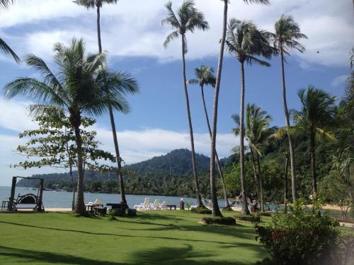 a park with palm trees and a playground at Koh Chang Bailan Beach Resort in Ko Chang