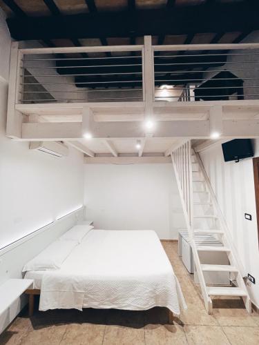 Ein Bett oder Betten in einem Zimmer der Unterkunft Agriturismo La Rustica