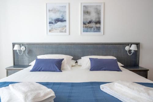 T2 Altura, by Casas do Verãoにあるベッド
