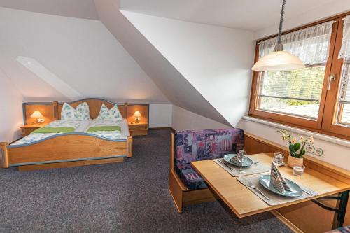 A bed or beds in a room at Seeappartements Bacher
