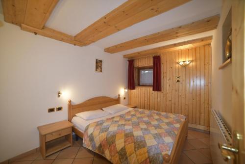 מיטה או מיטות בחדר ב-Casa De Guidi