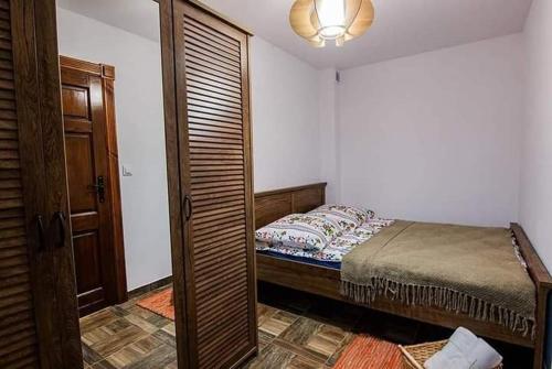 Posteľ alebo postele v izbe v ubytovaní Roganty