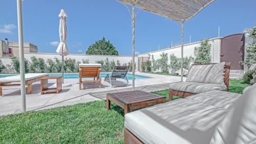 Der Swimmingpool an oder in der Nähe von VIlla Ercolani Luxury by HDSalento