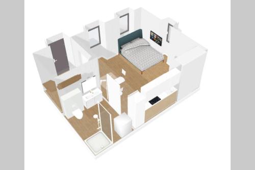 a floor plan of a room with a bed at Studio neuf 001 proche gare TGV, A36 et Hôpital in Botans