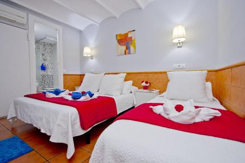Postel nebo postele na pokoji v ubytování Barcelona City Rooms