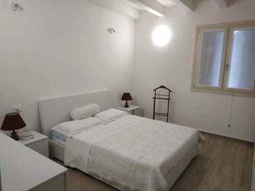 Posteľ alebo postele v izbe v ubytovaní Villa Paradiso del Garda Belvedere