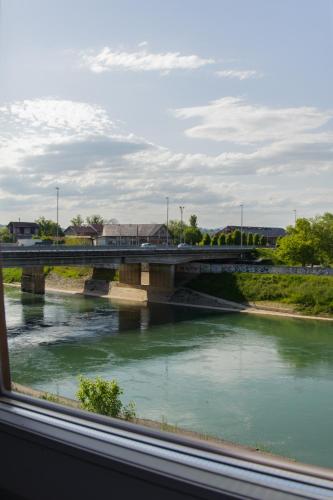 a view of a bridge over a river at Cozy river view apartment in Karlovac