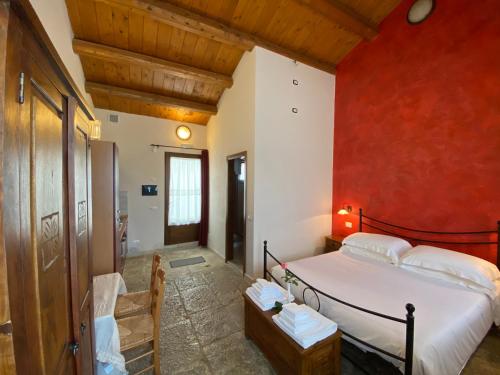 Postel nebo postele na pokoji v ubytování Mastro Vanni - Urban Masseria