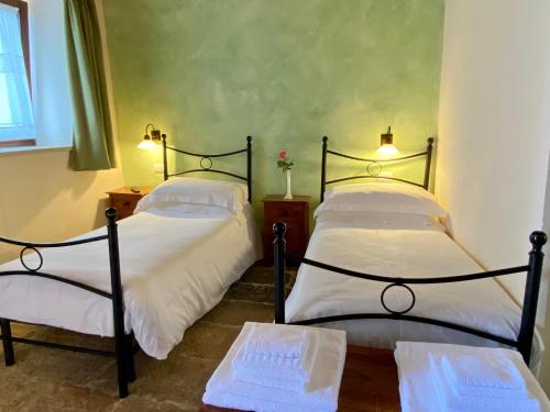 Postel nebo postele na pokoji v ubytování Mastro Vanni - Urban Masseria
