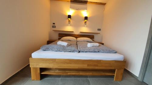Postel nebo postele na pokoji v ubytování Magic Apartment centre mezonet