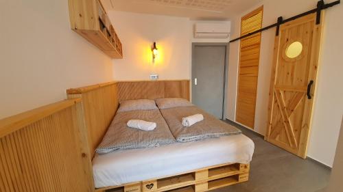 Postel nebo postele na pokoji v ubytování Magic Apartment centre mezonet