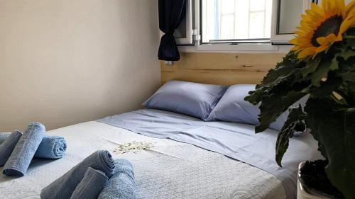 Postel nebo postele na pokoji v ubytování Trullallegro