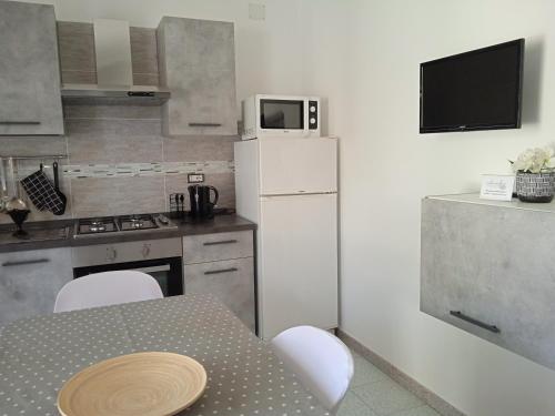 Η κουζίνα ή μικρή κουζίνα στο Guest House Oleandro