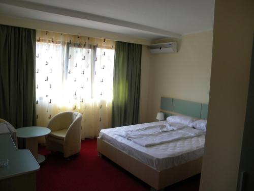 Postel nebo postele na pokoji v ubytování Vilele Soarelui