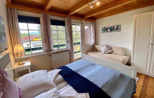 Кровать или кровати в номере Landhaus Klopein