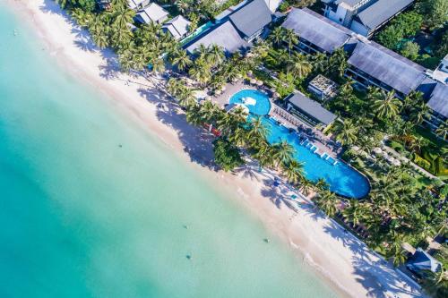 an aerial view of the beach and the ocean at KC Grande Resort Koh Chang in Ko Chang