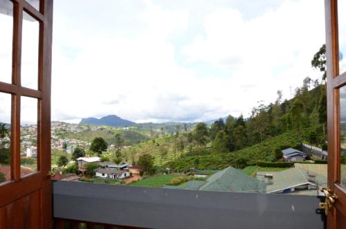 a view from the balcony of a house at Heaven Seven Nuwara Eliya in Nuwara Eliya