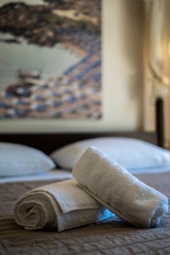 a towel sitting on top of a table at Ladiko Suites - Faliraki in Faliraki