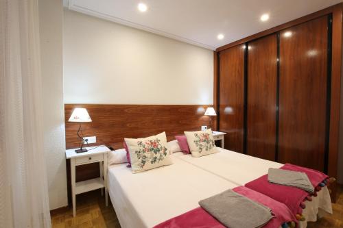 Postel nebo postele na pokoji v ubytování Apartamento Oviedo General Elorza