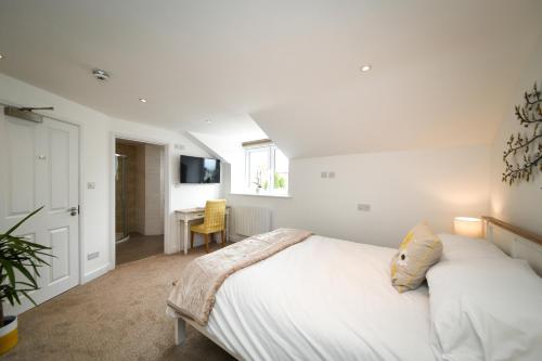 Кровать или кровати в номере Lakeside Old Hunstanton