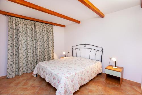 Giường trong phòng chung tại Appartamento Sole Mare Citai