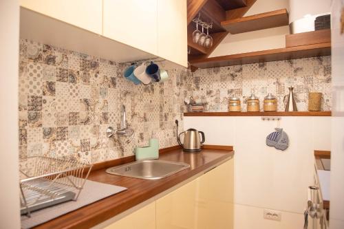 Køkken eller tekøkken på La terrazza di Chiara - vista mare