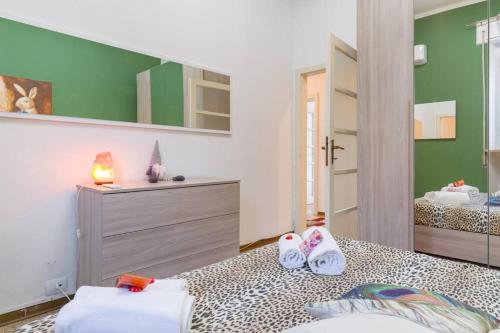 Postel nebo postele na pokoji v ubytování GARDALAND Residenza le Rose! 120 m2