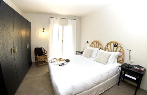 Kép Appartamento Centro Città quartiere Oltrarno con una camera da letto szállásáról Firenzében a galériában
