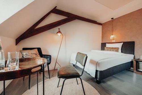 Postel nebo postele na pokoji v ubytování Hotel Freihof