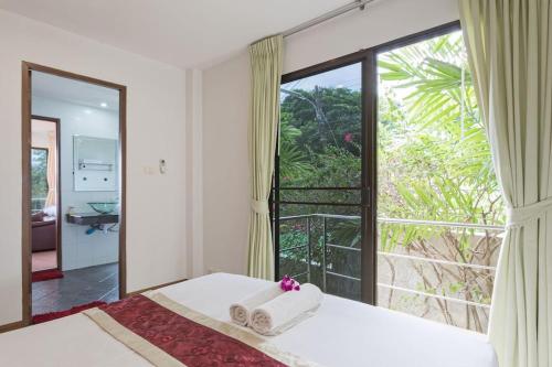 Giường trong phòng chung tại Mountain Seaview Luxury Apartments