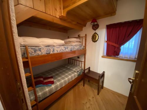 Posteľ alebo postele v izbe v ubytovaní Chalet Cretaz