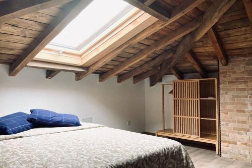 En eller flere senge i et værelse på Casa rural en parque natural con entorno espectacular
