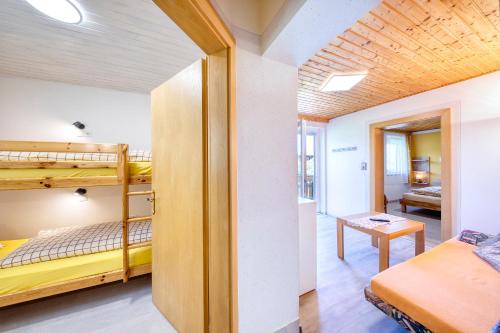 Postel nebo postele na pokoji v ubytování Gästehaus Lanthaler