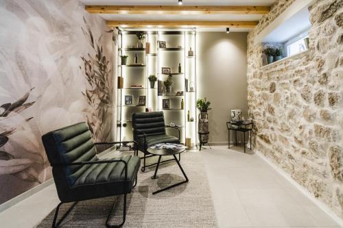 Posezení v ubytování Amoretta rooms